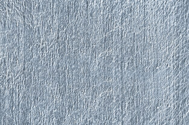 Gros plan d&#39;une texture de mur en béton rayé bleu