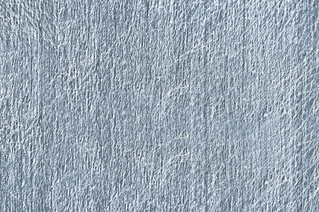 Gros plan d&#39;une texture de mur en béton rayé bleu