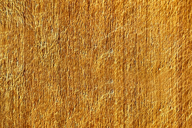 Gros plan d&#39;une texture de mur en béton rayé jaune