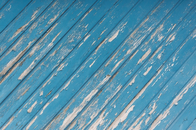 Gros plan d'une vieille surface en bois bleu ébréché