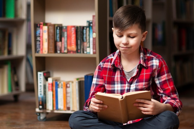 High angle little boy reading