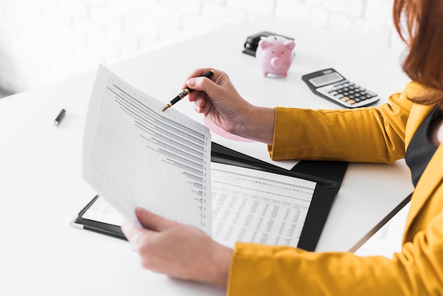 High angle woman revising documents