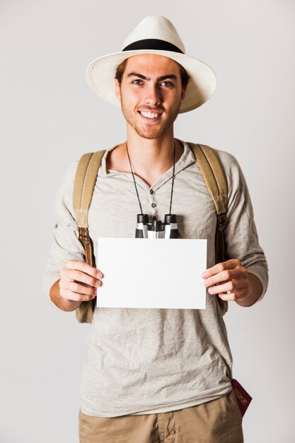 Hipster man holding paper