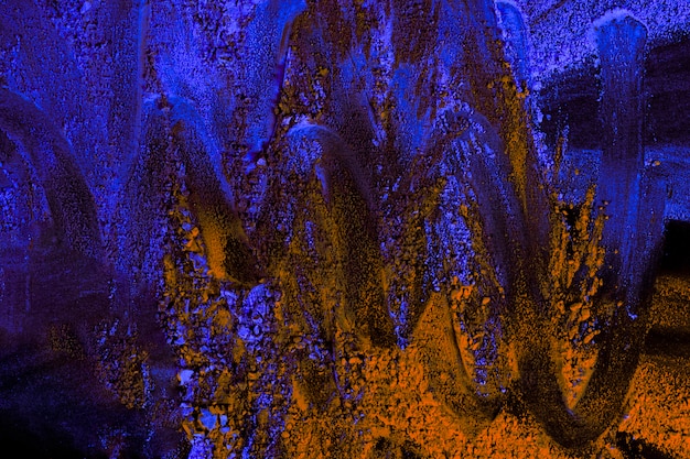 Photo gratuite holi bleu et orange coloré avec un design en zigzag