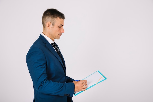 Homme d&#39;affaires avec le presse-papiers