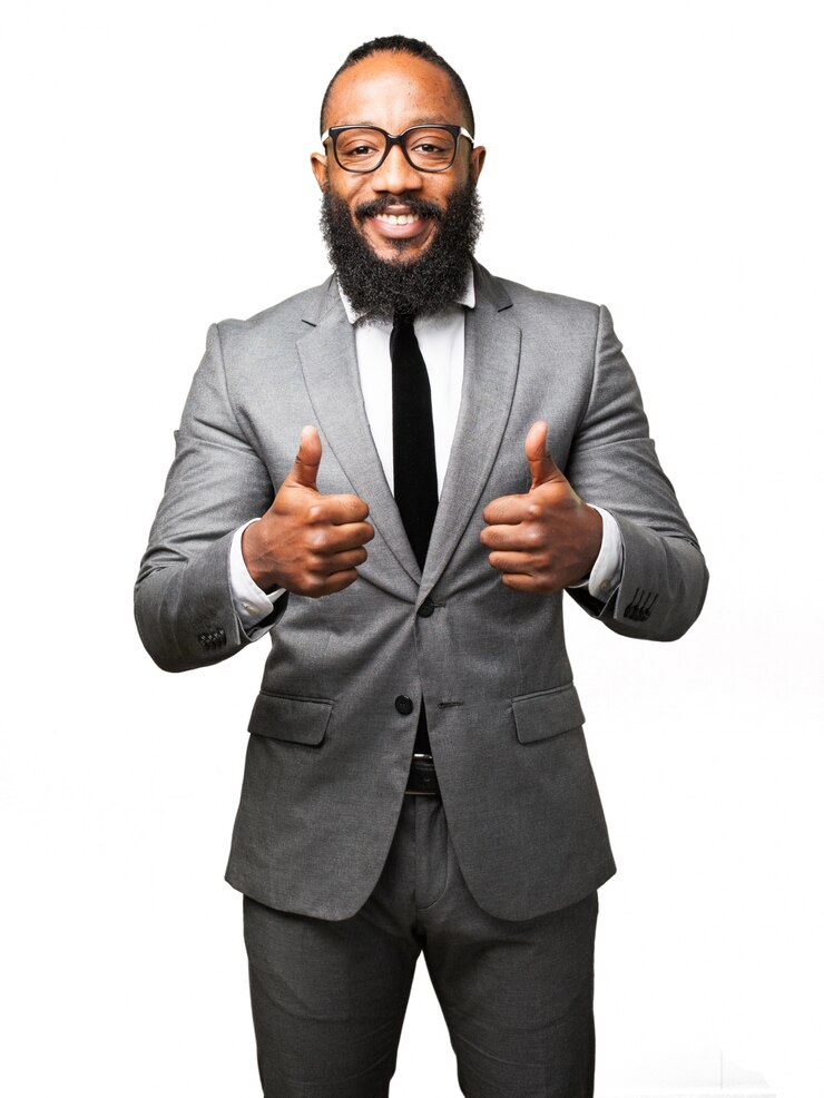 Homme en costume avec thumbs up