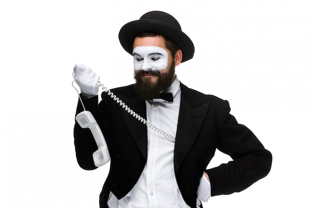 Photo gratuite homme dans l'image mime tenant un combiné.