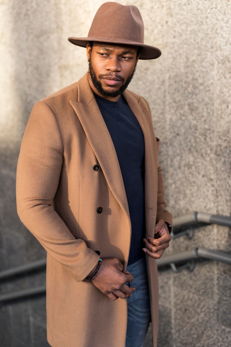 Photo gratuit homme élégant portant de beaux vêtements et un chapeau