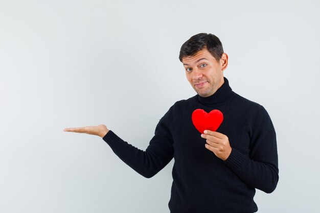 Un homme expressif pose dans le studio