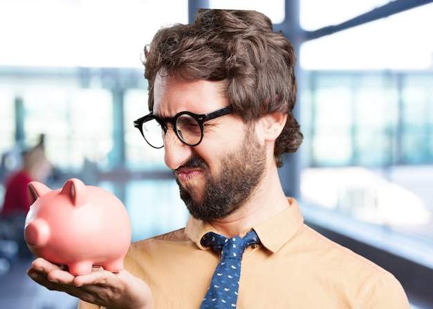 homme fou avec expression piggy bank.funny