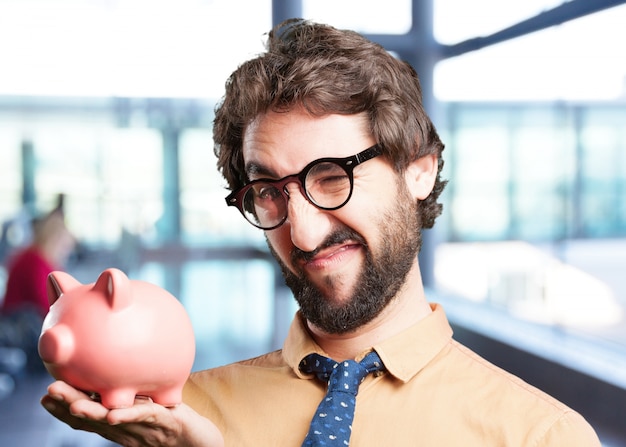 homme fou avec expression piggy bank.funny