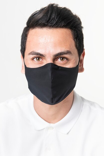 Homme portant un masque en tissu noir pour la campagne de protection COVID-19