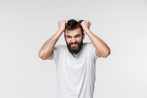 Homme de succès gagnant heureux extatique célébrant être un gagnant. Image énergétique dynamique du modèle masculin