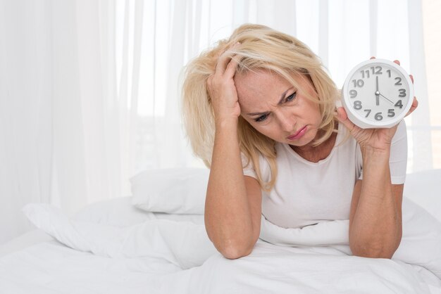 Horloge de femme fatiguée