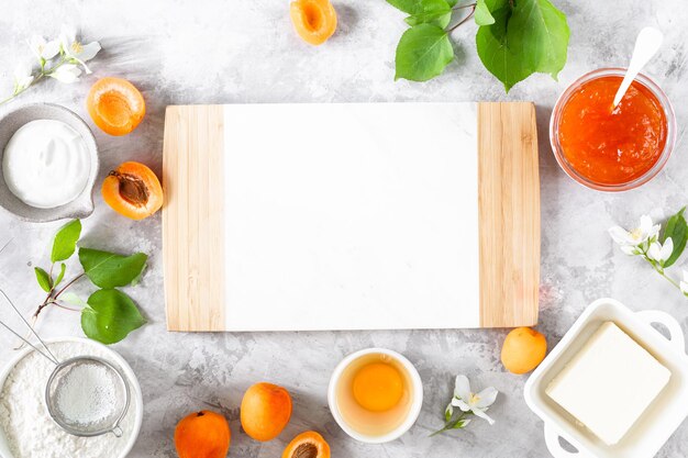 Ingrédients pour la cuisson de la tarte aux abricots maison Beurre Sucre Confiture d'abricots Vue de dessus