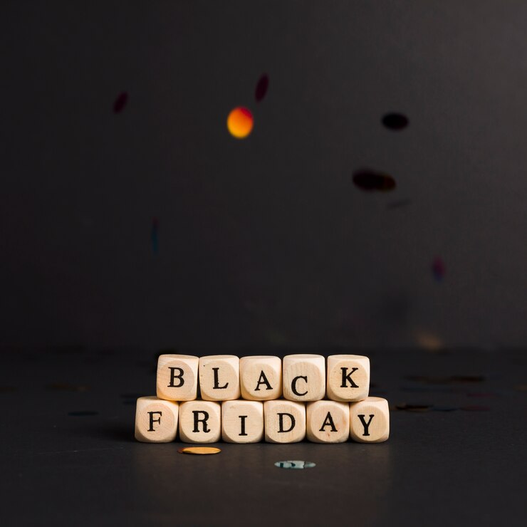 Photo gratuit inscription du vendredi noir sur des cubes avec des confettis brillants