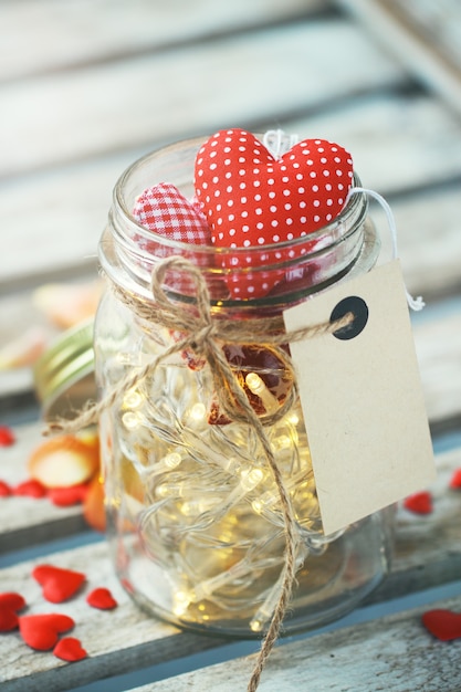 Jar avec les lumières et les cœurs partout