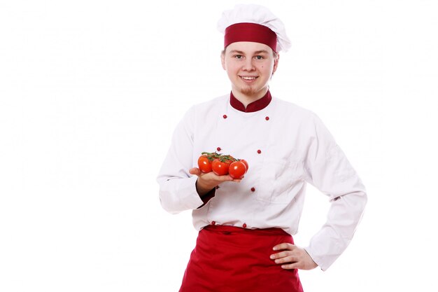 Jeune chef au paprika rouge