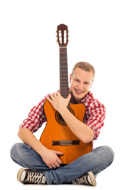 Jeune musicien avec une guitare