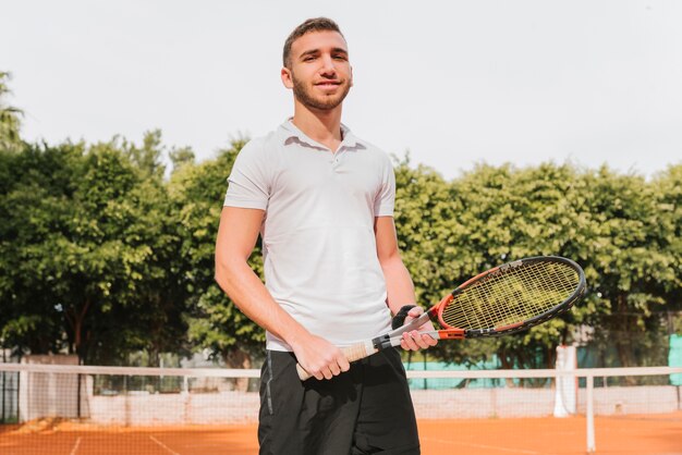 Jeune, tennis joueur, poser