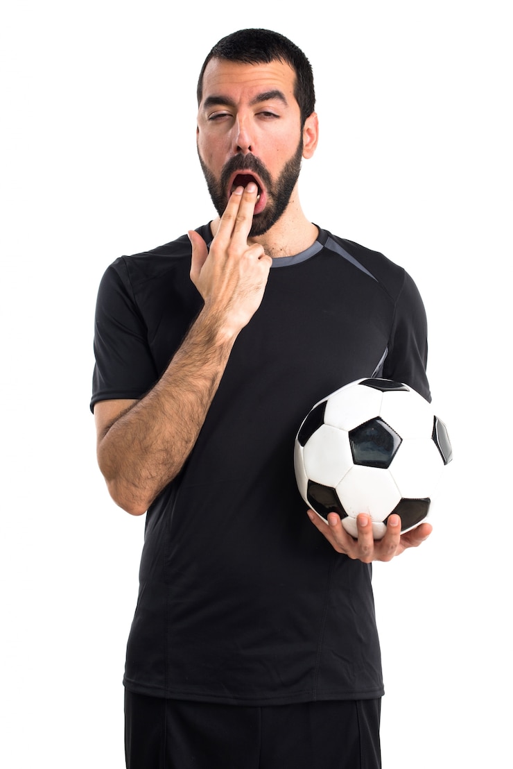 Photo gratuit joueur de football faisant un geste de vomissement