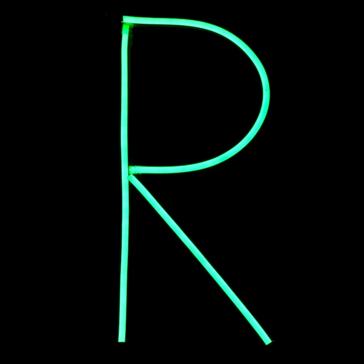 Photo gratuit lettres de l&#39;alphabet des néons verts