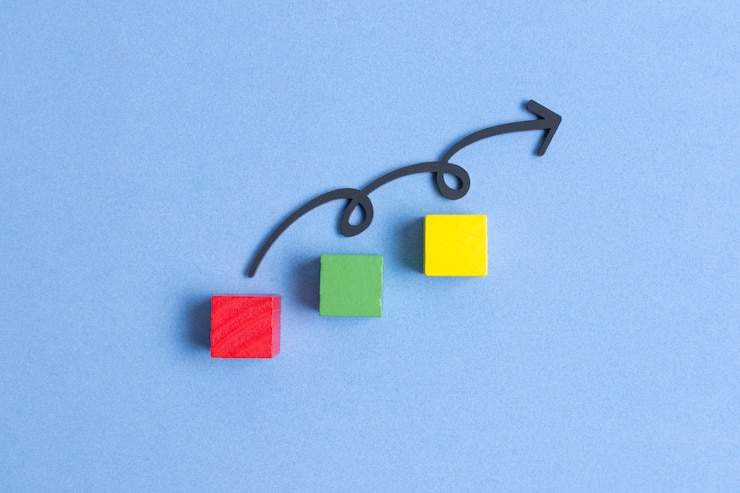 Photo gratuit ligne sinueuse sautant sur des cubes colorés