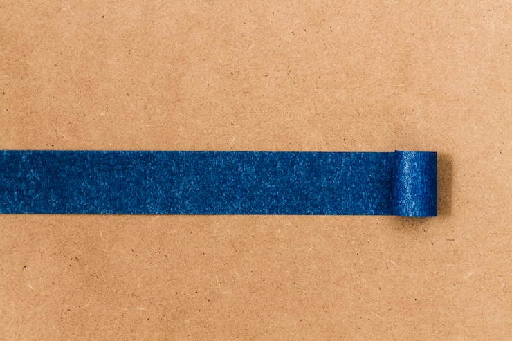 Photo gratuit ligne de texture adhésive bleue pour papier peint