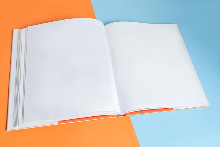 Photo gratuit livre papier physique sur fond agrandi