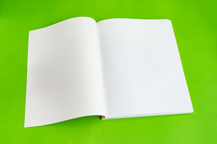 Photo gratuit livre papier physique sur fond agrandi