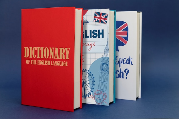 Photo gratuite livres en anglais avec fond bleu