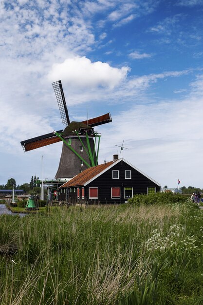 Low angle shot of windmills in Zaanse Schans quartier