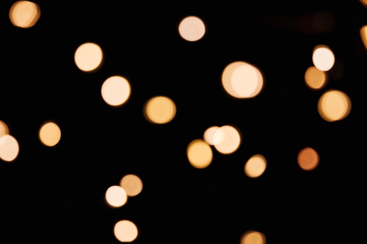 Photo gratuit lumières de noël sur fond noir