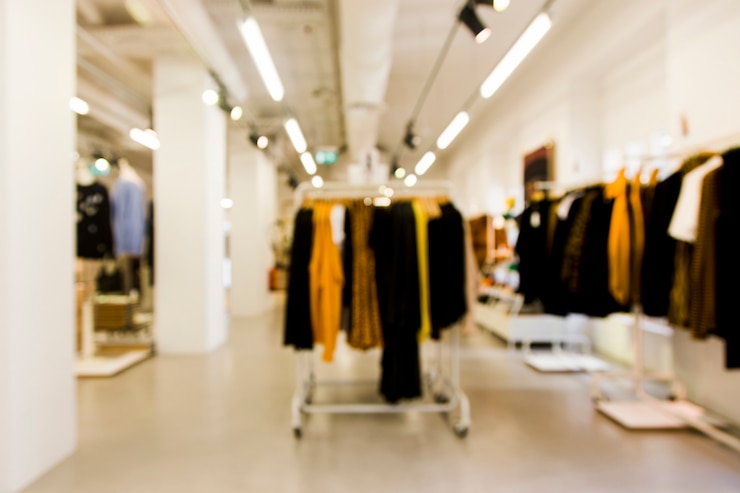 Photo gratuit magasin de vêtements avec un effet flou