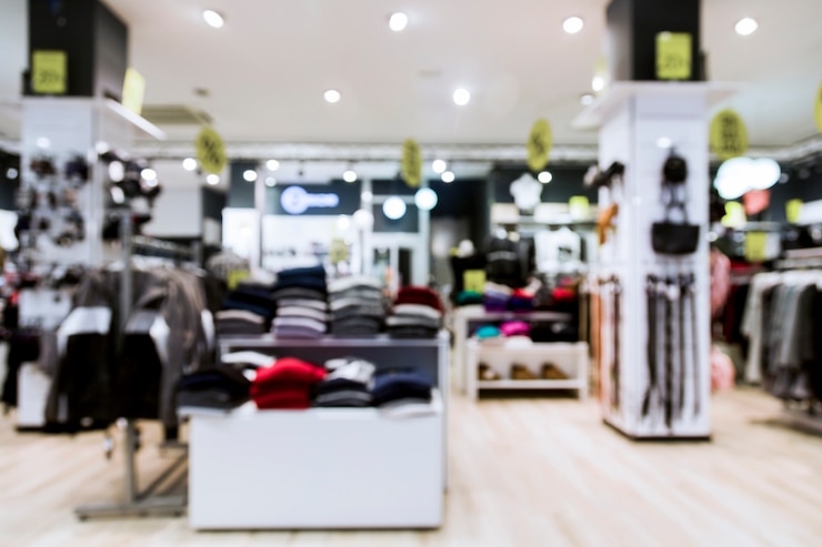 Photo gratuit magasin de vêtements avec effet flou