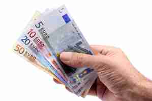 Photo gratuite main tenant euros monnaie