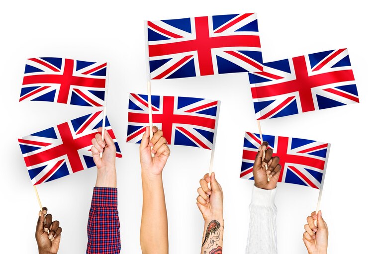 Photo gratuit mains agitant le union jack