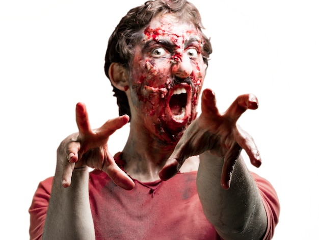 Photo gratuite mains et le visage plein de sang zombie
