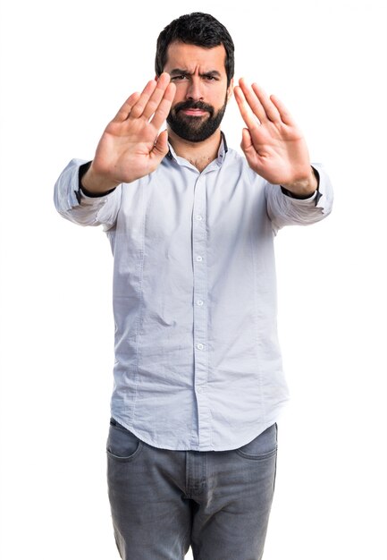 Man making stop sign