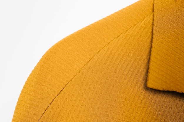 Photo gratuite manteau jaune texturé gros plan