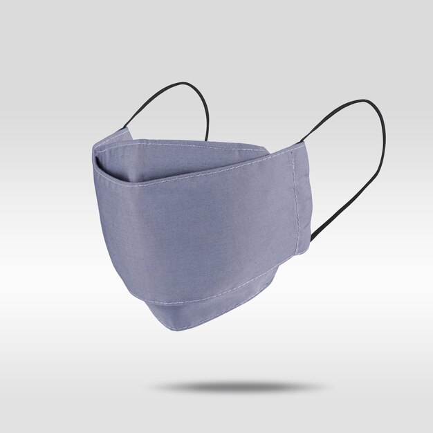 Masque en tissu bleu violacé clair sur fond gris