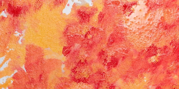 Photo gratuite mélange de peinture rouge et orange