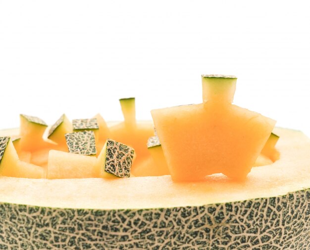 Melon de cantaloupe sur blanc