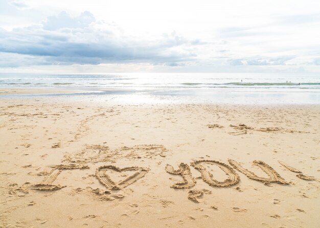 Message je t&#39;aime sur le sable