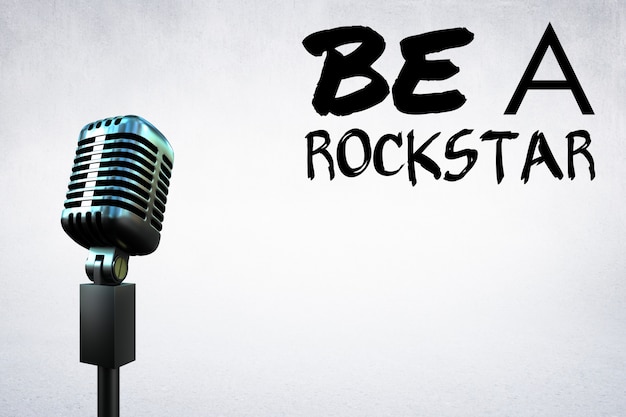 Photo gratuite microphone avec un message de motivation