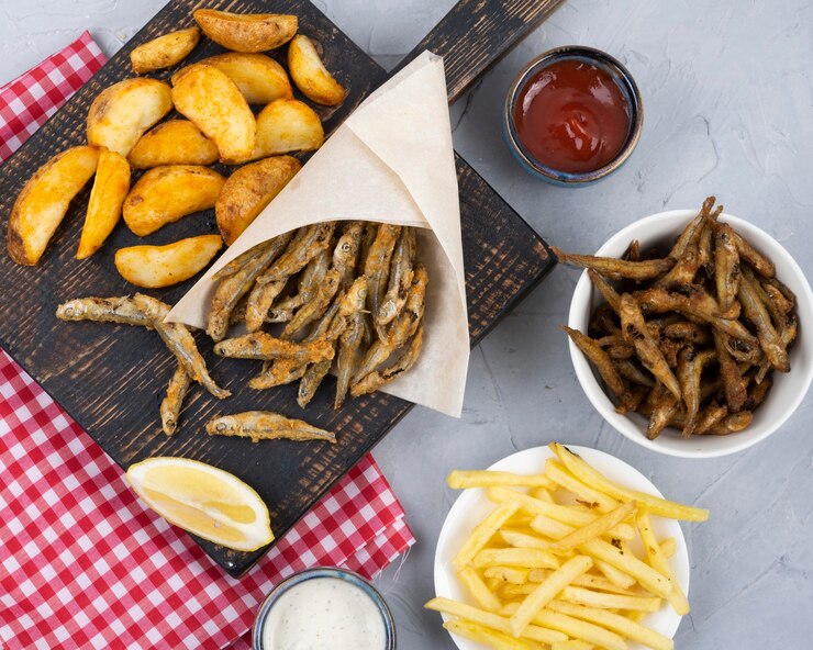 Photo gratuit mise à plat du concept de délicieux fish and chips