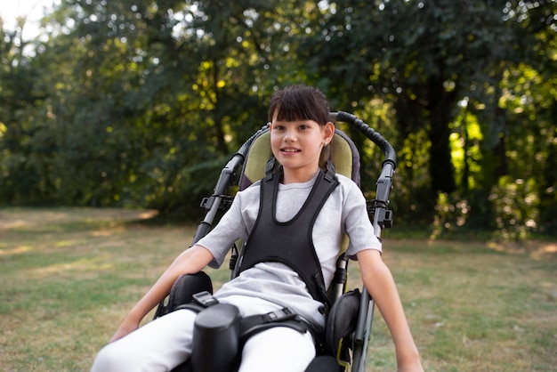 Mode de vie de l'enfant en fauteuil roulant