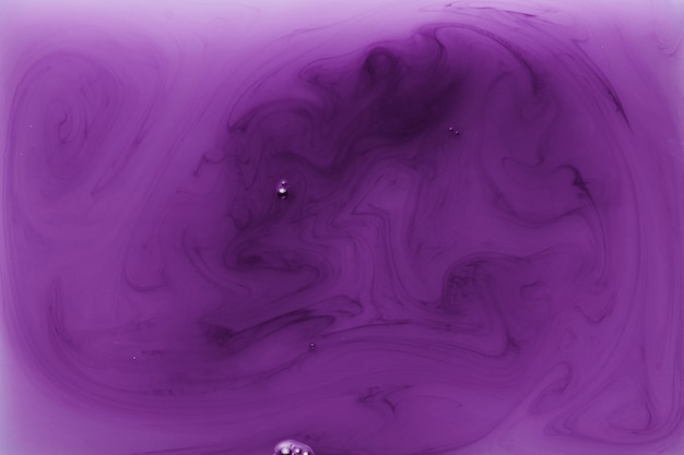 Photo gratuite modèle de fluide liquide violet abstrait