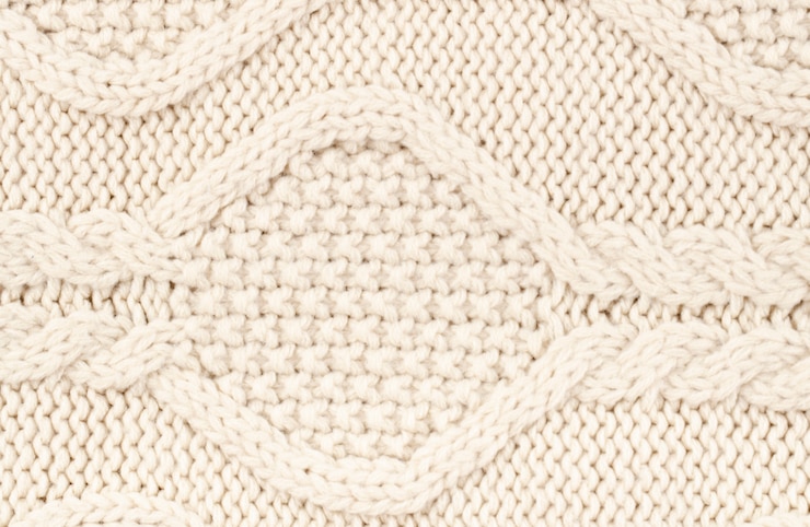 Photo gratuit motif crocheté en laine crème