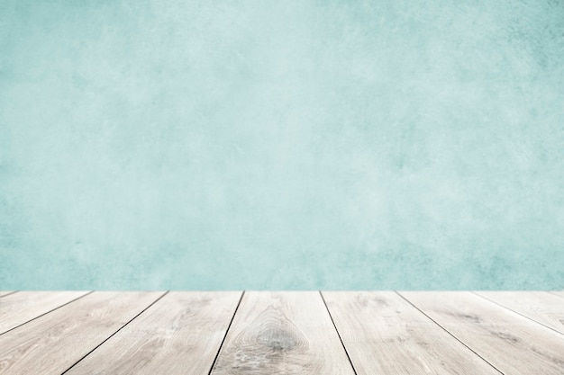 Mur bleu pastel avec fond de produit de plancher en bois